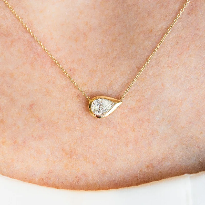 East-West Bezel Pear Diamond Pendant