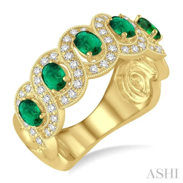 4x3 MM Oval Cut Emerald and 1/2 Ctw Round Cut Diamond Ring in 14K Yellow Gold