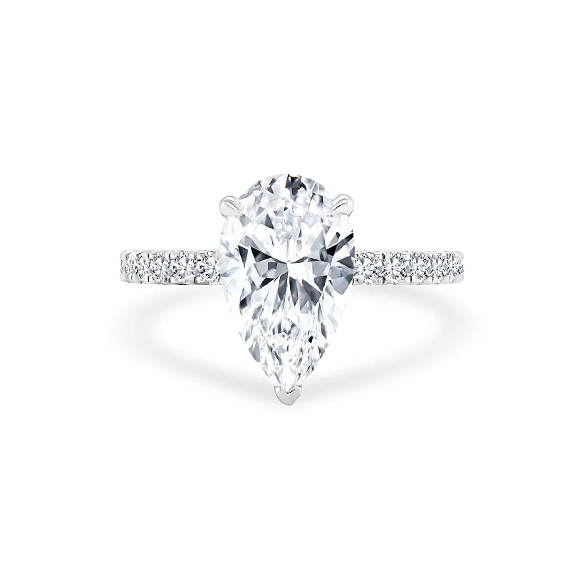 Pear Cut Solitaire on Diamond Band