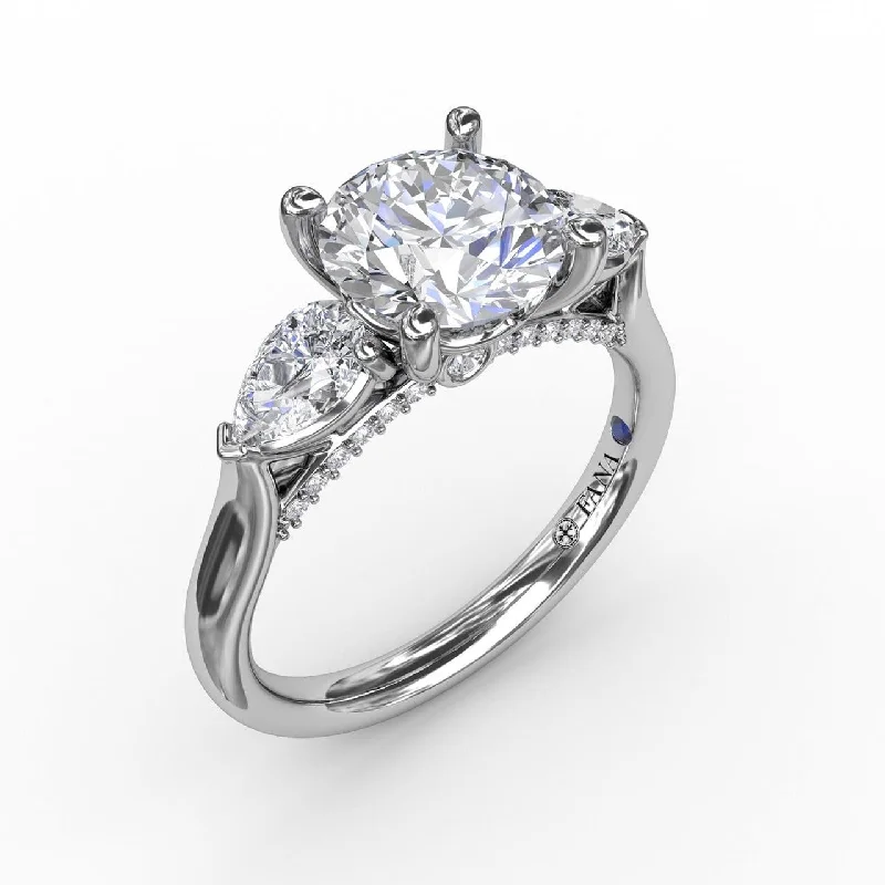 Classic Three-Stone Engagement Ring With Pear-Shape Side Diamonds