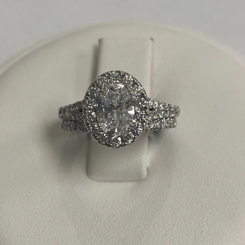 14kt White Gold Halo and Oval Diamond Wedding Set