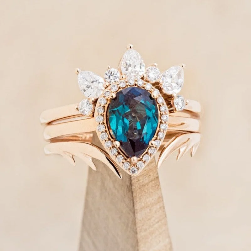 "CLARISS" - BRIDAL SUITE - PEAR CUT LAB-GROWN ALEXANDRITE ENGAGEMENT RING WITH DIAMOND HALO & TRACERS