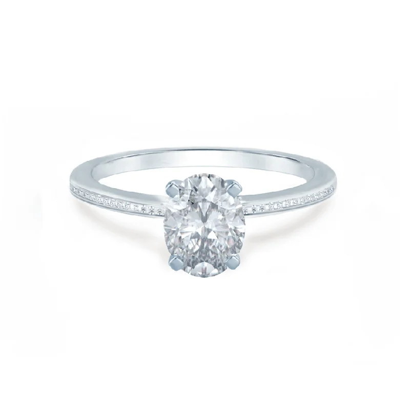 IRIS - Oval Moissanite 18k White Gold Petite Channel Set Ring