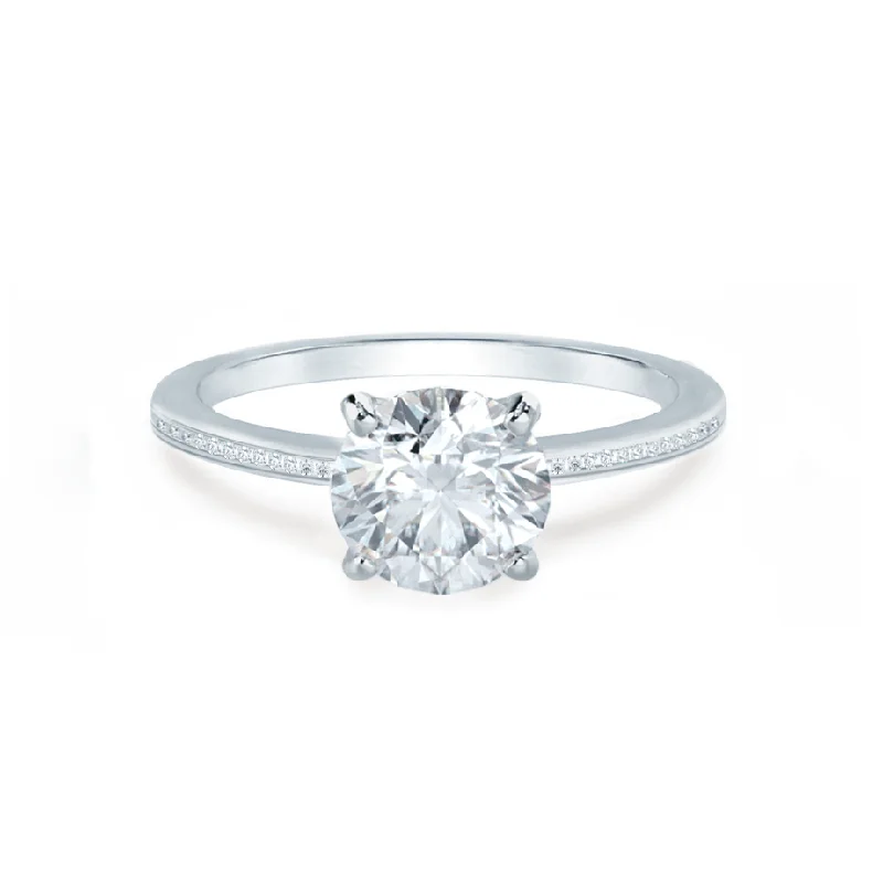 IRIS - Round Moissanite 18k White Gold Petite Channel Set Ring