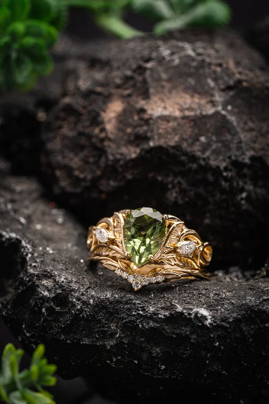 Magical peridot engagement ring set with a wedding band for a druid bride / Ikar