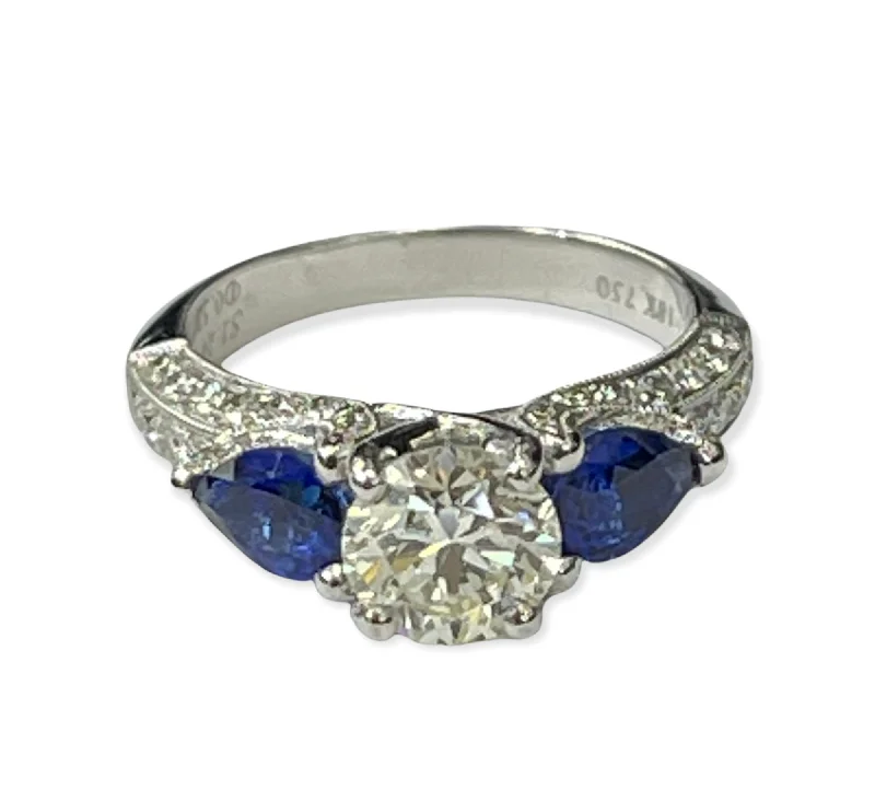 Round Brilliant Diamond Solitaire Ring With Blue Sapphire Accents White Gold